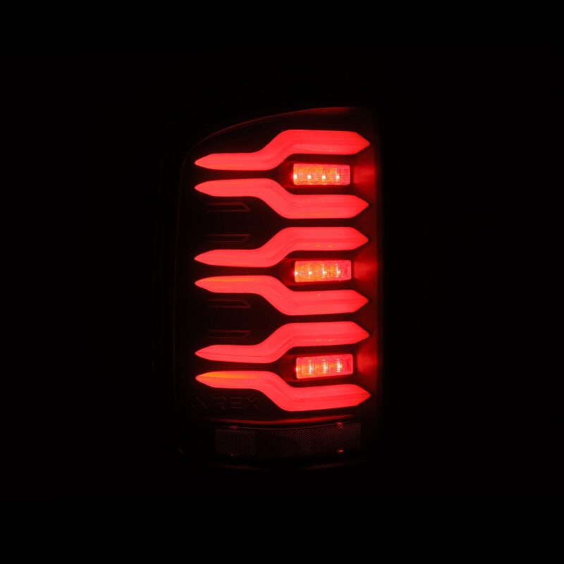 AlphaRex AlphaRex 14-18 GMC Sierra 1500/2500HD/3500HD LUXX-Series LED Tail Lights Blk w/Actv Light & Seq. Sig Tail Lights aftermarket performance part