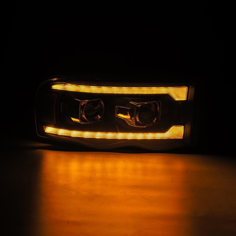 AlphaRex 02-05 Dodge Ram 1500 LUXX LED Proj Headlights Plank Style Black w/Activ Light/Seq Signal AlphaRex Headlights AXOPROS