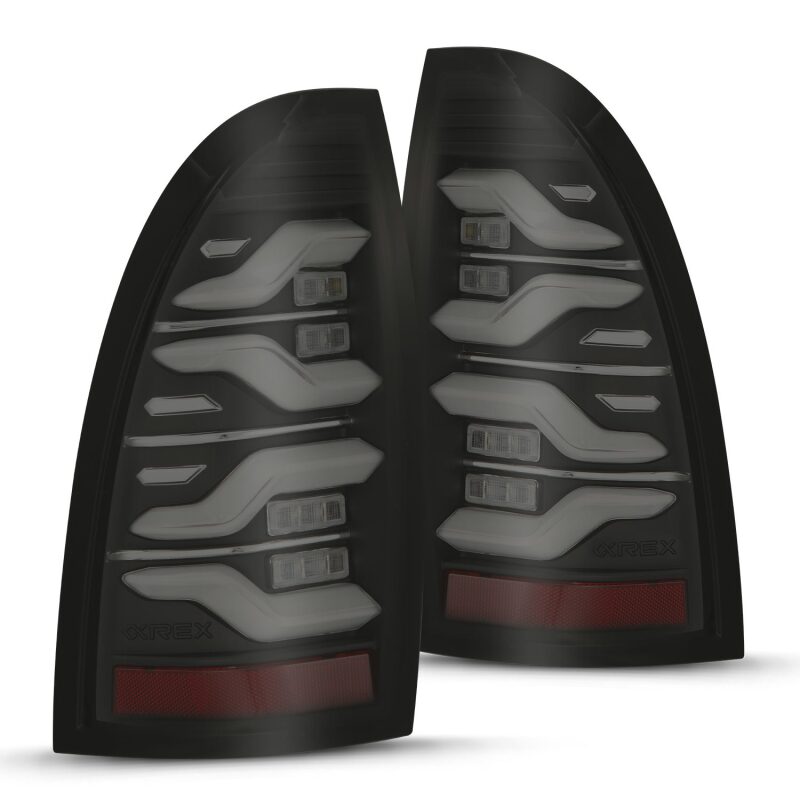 AlphaRex 05-15 Toyota Tacoma LUXX LED Taillights Blk w/Activ Light/Seq Signal AlphaRex Tail Lights AXOPROS