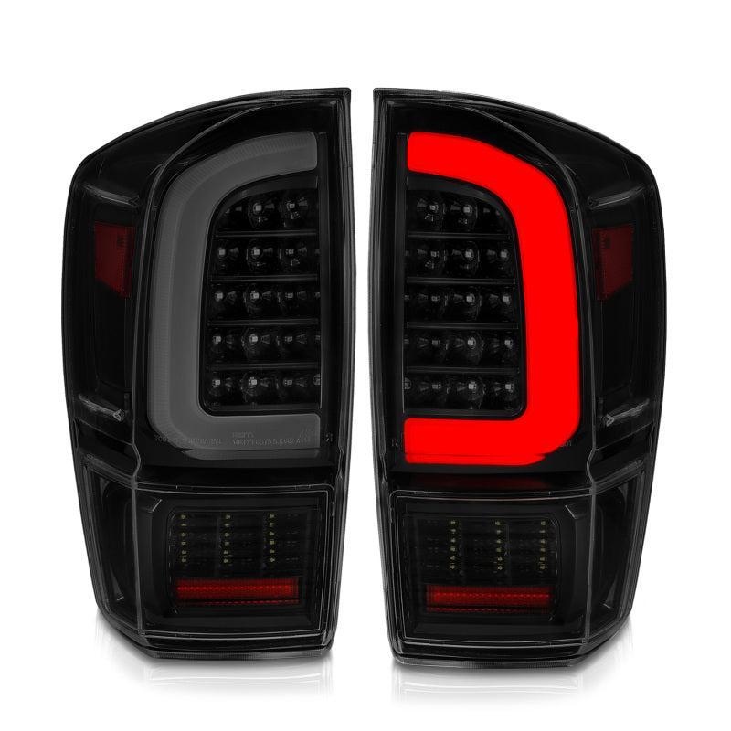 ANZO 16-21 Toyota Tacoma LED Tail Lights - w/ Light Bar Sequential Black Housing & Smoke Lens ANZO Tail Lights  AXOPROS