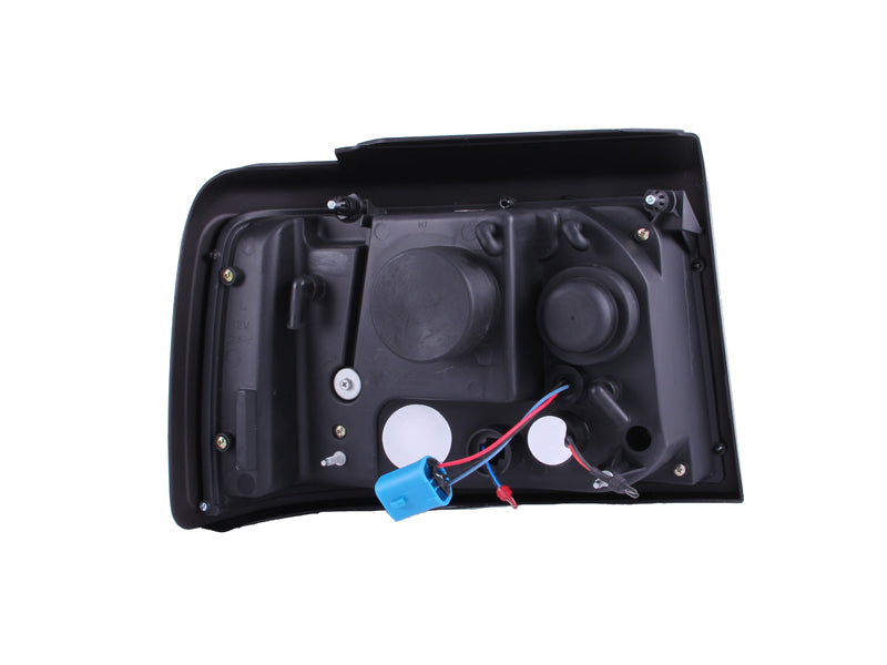 ANZO 1992-1996 Ford F-150 Projector Headlights w/ Halo Black w/ Side Markers and Parking Lights ANZO Headlights AXOPROS