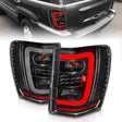 ANZO 1999-2004 Jeep Grand Cherokee LED Tail Lights w/ Light Bar Black Housing Clear Lens ANZO Tail Lights  AXOPROS