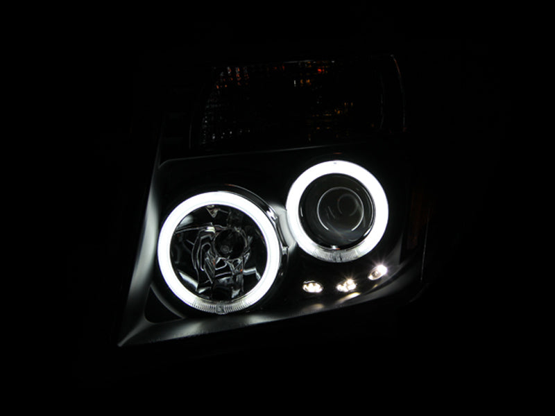 ANZO 2005-2008 Nissan Frontier Projector Headlights w/ Halo Black ANZO Headlights AXOPROS