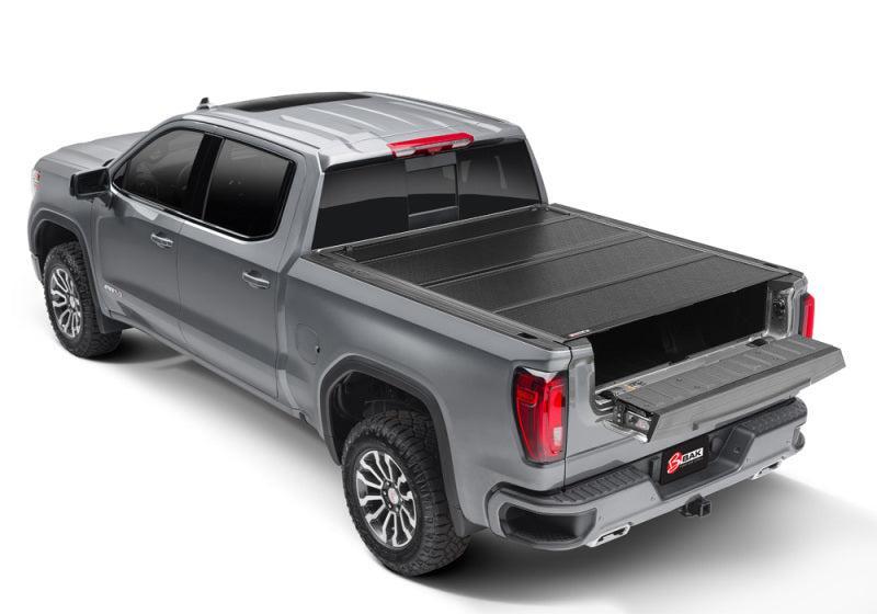 BAK 2020 Chevy Silverado 2500/3500 HD 6ft 9in Bed BAKFlip F1 BAK Tonneau Covers - Hard Fold AXOPROS