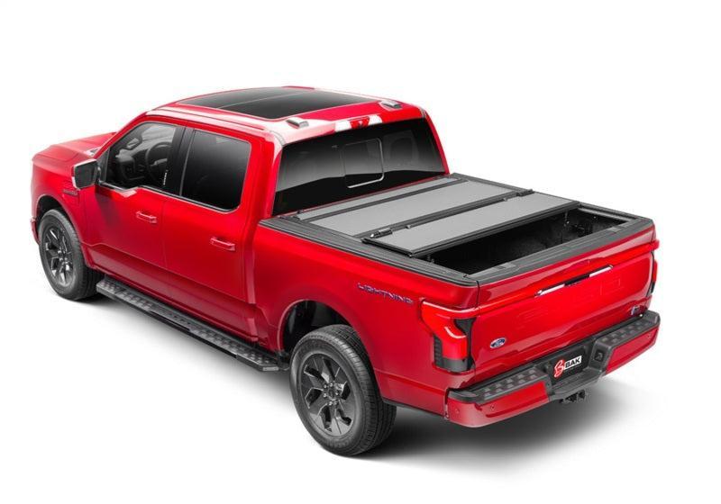 BAK 21-22 Ford F-150 (Incl. 2022 Lightning) BAKFlip MX4 5.7ft Bed Cover - Matte Finish BAK Tonneau Covers - Hard Fold AXOPROS