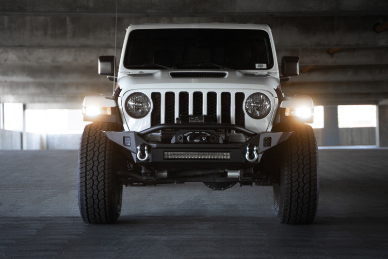 DV8 Offroad 18-23 Jeep Wrangler JL / 20-23 Jeep Gladiator JT FS-7 Mid-Width Winch Front Bumper DV8 Offroad Bumpers - Steel AXOPROS
