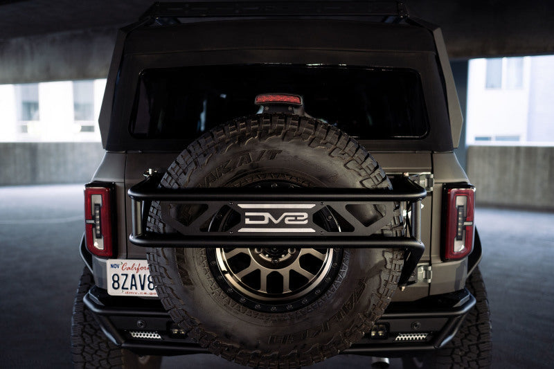 DV8 Offroad 21-23 Ford Bronco Spare Tire Guard & Accessory Mount DV8 Offroad Hitch Receivers  AXOPROS