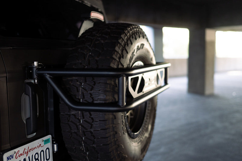DV8 Offroad 21-23 Ford Bronco Spare Tire Guard & Accessory Mount DV8 Offroad Hitch Receivers  AXOPROS
