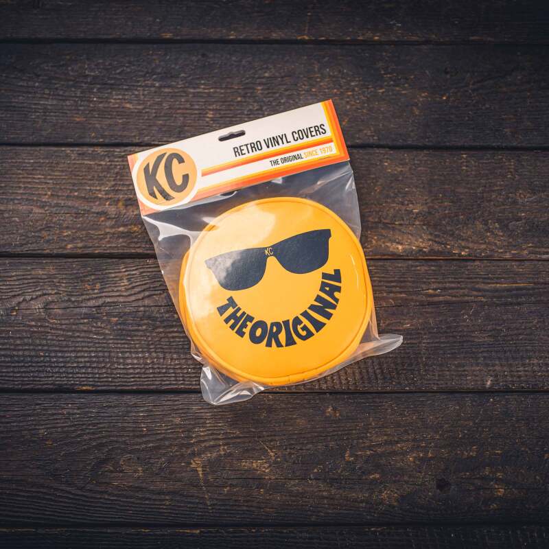 KC HiLiTES Retro 6in Round Yellow Vinyl Light Cover w/ Black KC Sunglasses Logo KC HiLiTES Light Covers and Guards AXOPROS