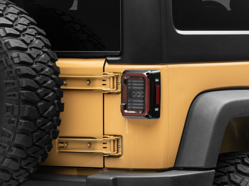 Raxiom 07-18 Jeep Wrangler JK Axial Series LED Halo Tail Lights- Black Housing (Dark Smoked Lens) Raxiom Tail Lights  AXOPROS