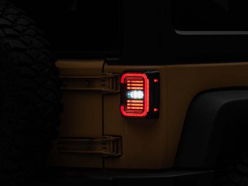 Raxiom 07-18 Jeep Wrangler JK Axial Series LED Halo Tail Lights- Black Housing (Dark Smoked Lens) Raxiom Tail Lights  AXOPROS