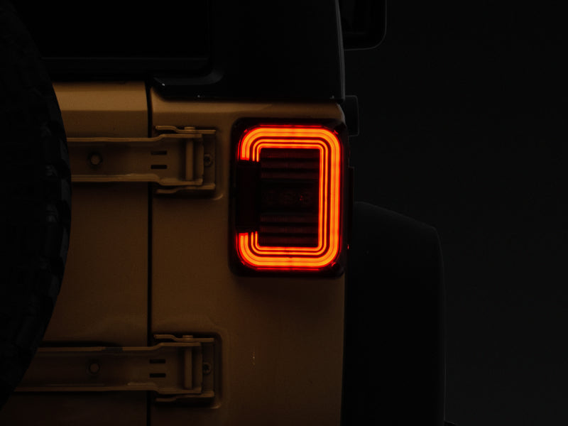 Raxiom 07-18 Jeep Wrangler JK Axial Series LED Halo Tail Lights- Black Housing (Dark Smoked Lens) Raxiom Tail Lights  AXOPROS