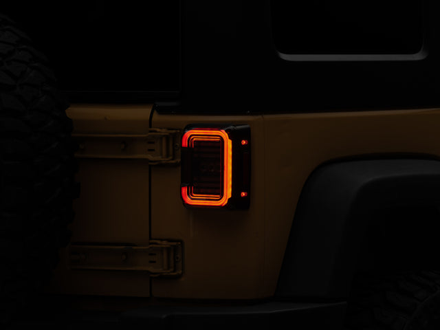 Raxiom 07-18 Jeep Wrangler JK Axial Series LED Halo Tail Lights- Black Housing (Dark Smoked Lens) Raxiom Tail Lights  AXOPROS