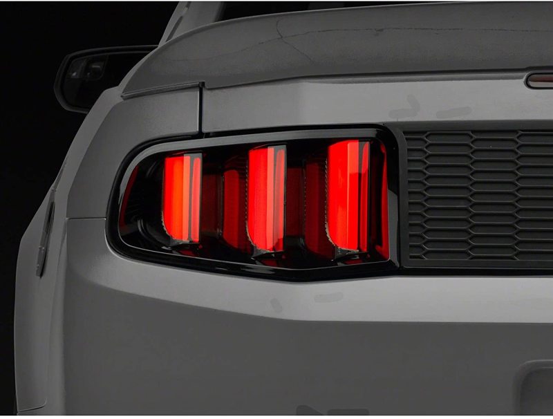 Raxiom 10-12 Ford Mustang Vector V2 LED Tail Lights - Gloss Black Housing (Clear Lens) Raxiom Tail Lights AXOPROS