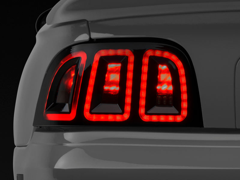 Raxiom 96-98 Ford Mustang Icon LED Tail Lights- Black Housing (Smoked Lens) Raxiom Tail Lights  AXOPROS