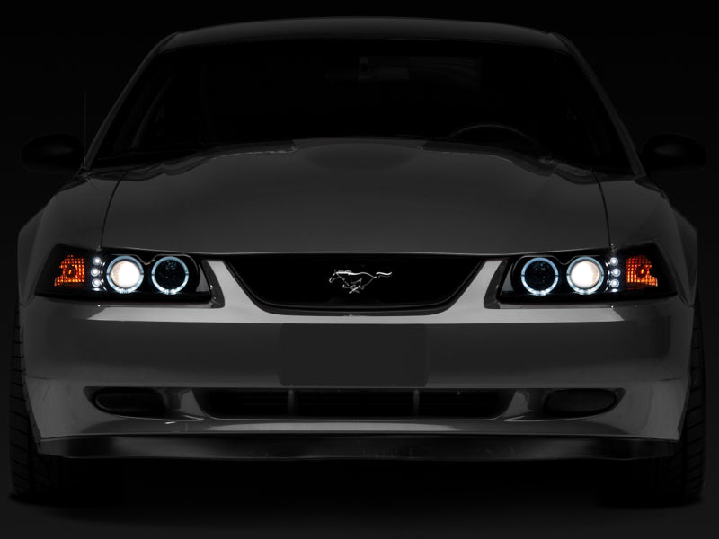 Raxiom 99-04 Ford Mustang Dual LED Halo Projector Headlights- Black Housing (Smoked Lens) Raxiom Headlights AXOPROS