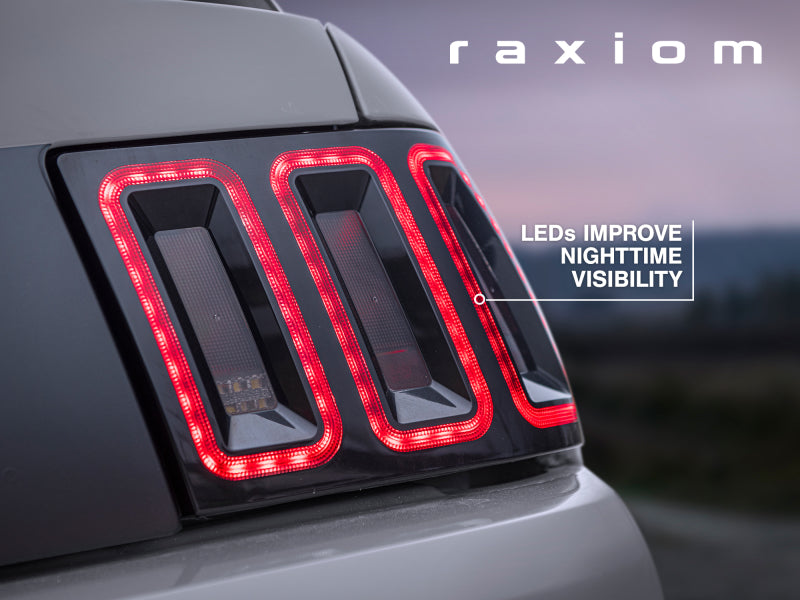 Raxiom 99-04 Ford Mustang Excluding 99-01 Cobra Icon LED Tail Lights- Black Housing (Smoked Lens) Raxiom Tail Lights  AXOPROS
