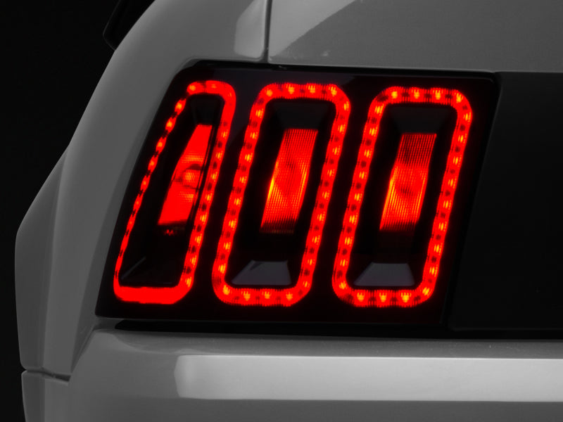 Raxiom 99-04 Ford Mustang Excluding 99-01 Cobra Icon LED Tail Lights- Black Housing (Smoked Lens) Raxiom Tail Lights  AXOPROS