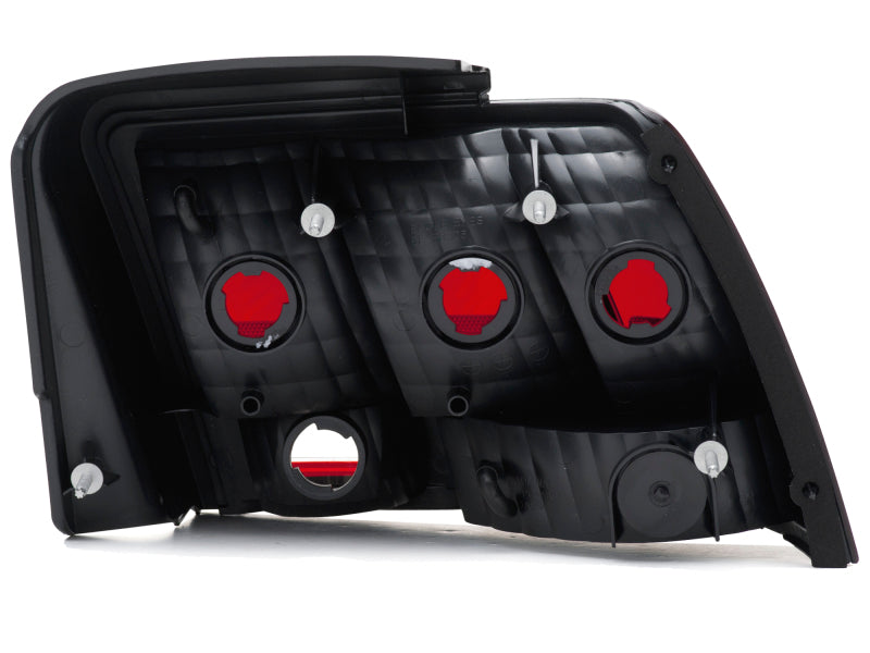 Raxiom 99-04 Ford Mustang Excluding 99-01 Cobra Tail Lights- Black Housing (Smoked Lens) Raxiom Tail Lights  AXOPROS