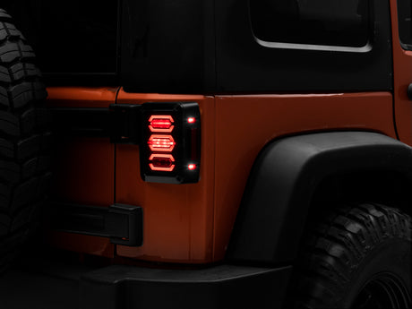 Raxiom Raxiom 07-18 Jeep Wrangler JK LED Tail Lights- Black Housing (Smoked Lens) Tail Lights aftermarket performance part