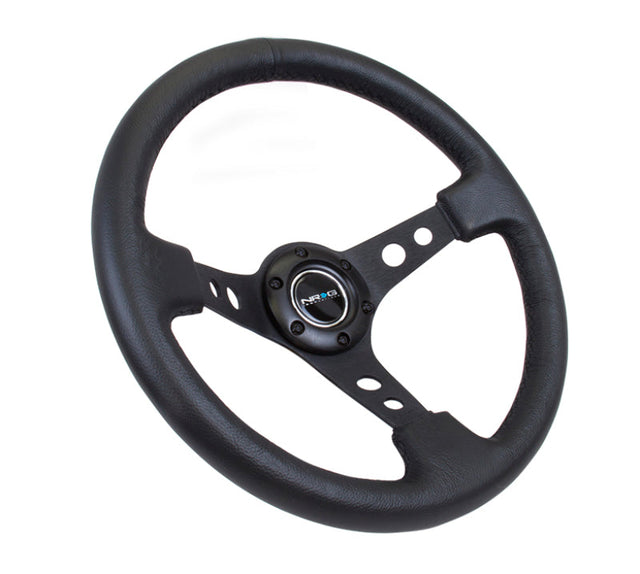 NRG Reinforced Steering Wheel (350mm / 3in. Deep) Blk Leather w/Blk Spoke & Circle Cutouts NRG Steering Wheels  AXOPROS