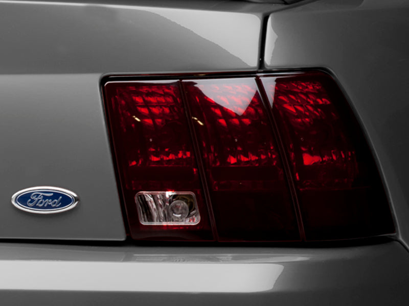 Raxiom 99-04 Ford Mustang Excluding 99-01 Cobra Tail Lights- Black Housing (Smoked Lens) Raxiom Tail Lights  AXOPROS
