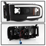 Spyder 02-05 Dodge Ram 1500 Light Bar Projector Headlights - Black (PRO-YD-DR02V2-LB-BK) SPYDER Headlights  AXOPROS