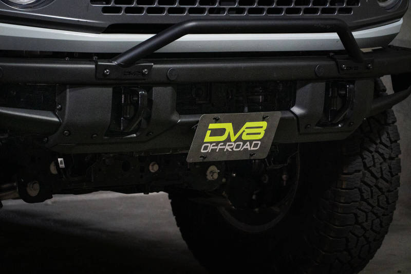 DV8 Offroad 21-22 Ford Bronco Factory Front Bumper Licence Relocation Bracket - Front DV8 Offroad License Plate Relocation  AXOPROS