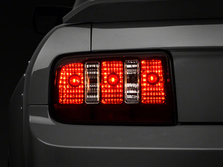 Raxiom Raxiom 05-09 Ford Mustang Coyote Tail Lights- Black Housing (Smoked Lens) Tail Lights aftermarket performance part