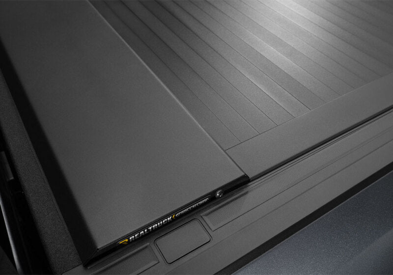 Roll-N-Lock 2019 Chevy Silverado 1500 68-3/8in E-Series Retractable Tonneau Cover Roll-N-Lock Tonneau Covers - Retractable  AXOPROS