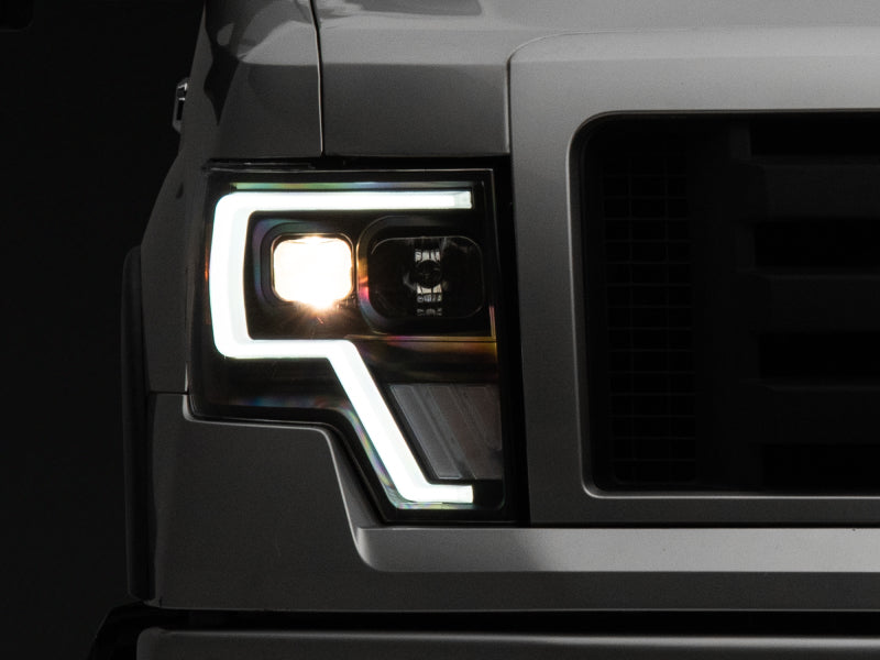Raxiom 09-14 Ford F-150 G4 Projector Headlights- Black Housing (Clear Lens) Raxiom Headlights  AXOPROS