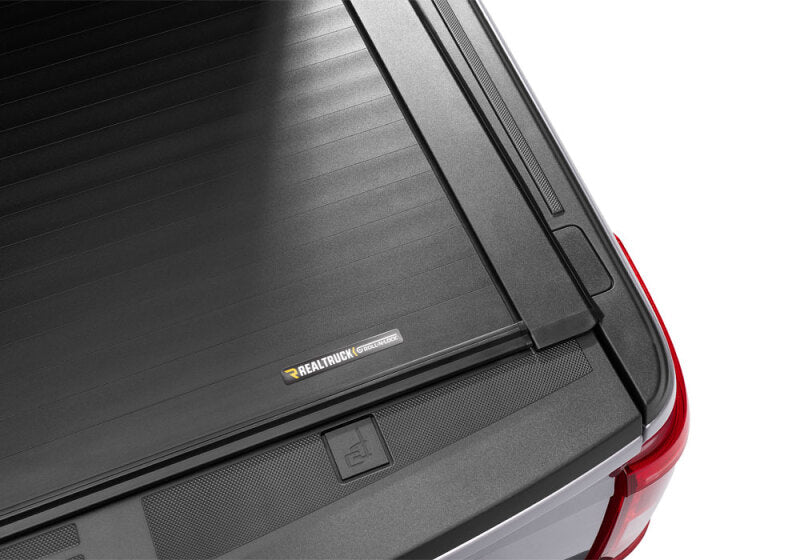 Roll-N-Lock 17-19 Ford F-250/F-350 Super Duty SB 80-3/8in A-Series Retractable Tonneau Cover Roll-N-Lock Tonneau Covers - Retractable  AXOPROS
