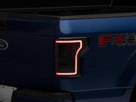 Raxiom Raxiom 15-17 Ford F-150 LED Tail Lights w/ SEQL Turn Signals- Black Housing (Clear Lens) Tail Lights aftermarket performance part