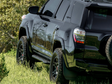 Cali Raised 10-24 Toyota 4Runner Step Ed Bolt On Rock Sliders - Kick Out/PwdrCoat Plate/Pwdr Cali Raised LED Steps  AXOPROS