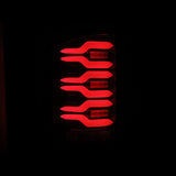 AlphaRex 14-18 GMC Sierra 1500/2500HD/3500HD LUXX-Series LED Tail Lights Blk/Red w/Actv Lgt Seq. Sig AlphaRex Tail Lights  AXOPROS