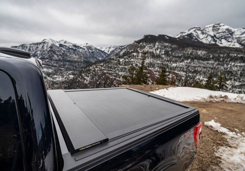 Roll-N-Lock 17-19 Ford F-250/F-350 Super Duty SB 80-3/8in A-Series Retractable Tonneau Cover Roll-N-Lock Tonneau Covers - Retractable  AXOPROS