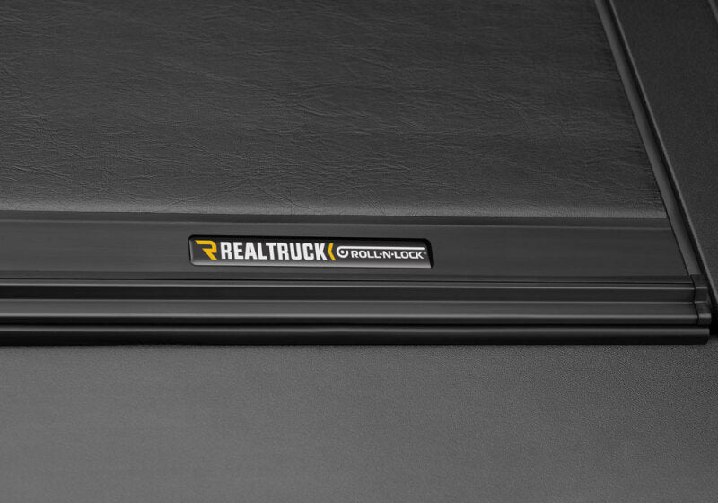 Roll-N-Lock 19-23 RAM 1500 w/o Swing Gate Tailgate SB 76.3in M-Series Retractable Tonneau Cover Roll-N-Lock Tonneau Covers - Retractable  AXOPROS
