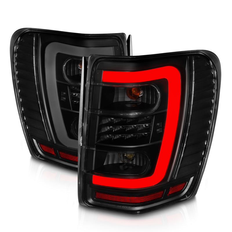 ANZO 1999-2004 Jeep Grand Cherokee LED Tail Lights w/ Light Bar Black Housing Smoke Lens ANZO Tail Lights  AXOPROS