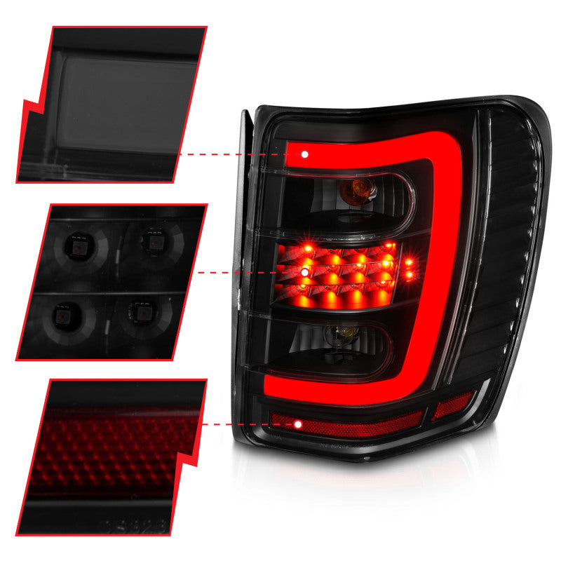 ANZO 1999-2004 Jeep Grand Cherokee LED Tail Lights w/ Light Bar Black Housing Smoke Lens ANZO Tail Lights  AXOPROS