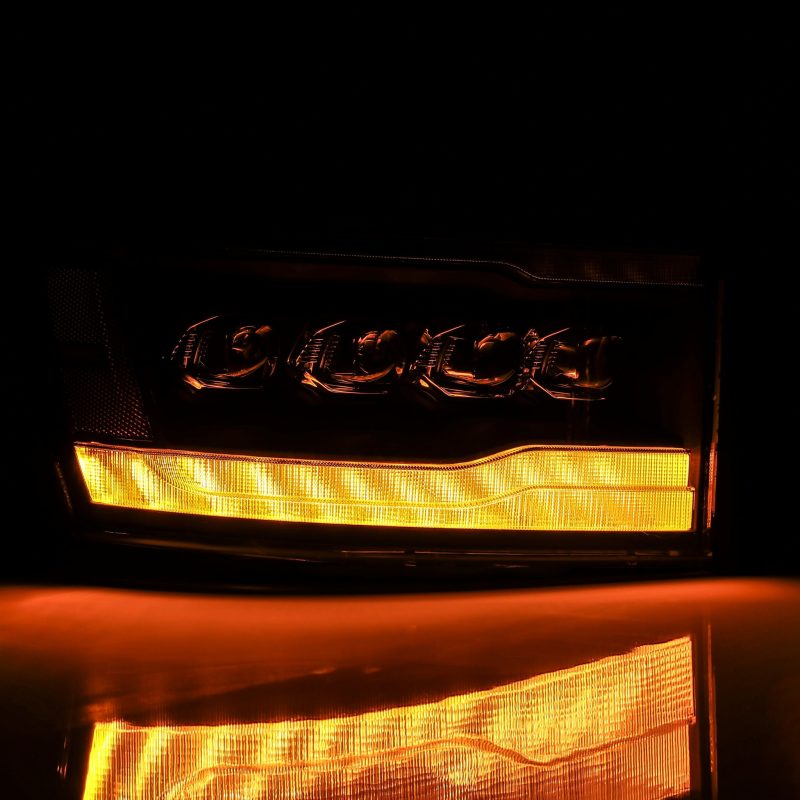 AlphaRex 06-08 Dodge Ram 1500HD NOVA LED ProjHeadlights Plank Style Blk w/Seq Signal/DRL/Amber LED AlphaRex Headlights  AXOPROS
