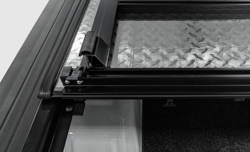 Access LOMAX Tri-Fold Cover Black Urethane Finish 22+ Toyota Tundra - 5ft 6in Bed Access