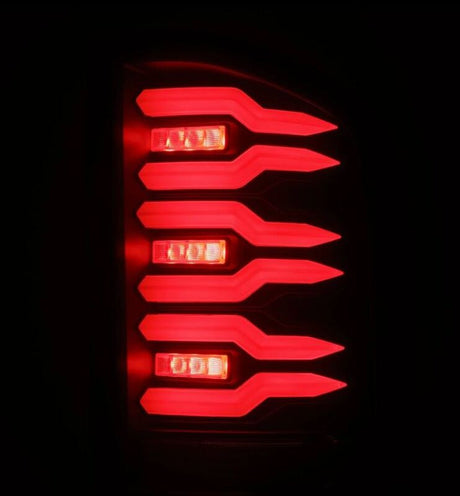 AlphaRex 07-14 Chevrolet Silverado 1500/2500HD/3500HD Luxx-Series LED Tail Lights Blk w/Smoked Lens AlphaRex Tail Lights  AXOPROS