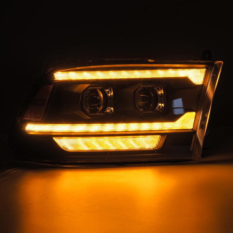 AlphaRex 09-18 Ram 1500/2500 PRO-Series Proj Headlights Black w/Sequential Signal and Top/Middle DRL - AXOPROS