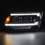 AlphaRex 09-18 Ram 1500/2500 PRO-Series Proj Headlights Black w/Sequential Signal and Top/Middle DRL - AXOPROS