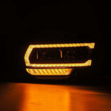 AlphaRex 19-21 Ram 2500 LUXX LED Proj Headlights Plank Style Alpha Blk w/Activ Light/Seq Signal/DRL AlphaRex Headlights  AXOPROS