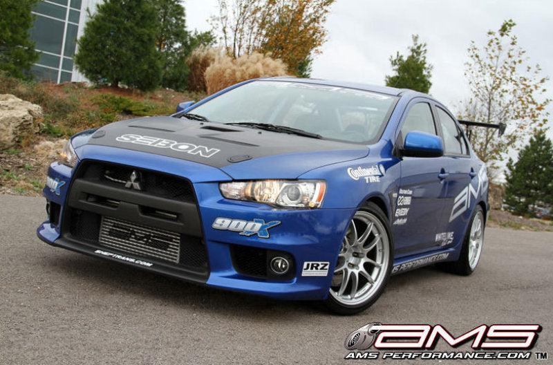 AMS Performance 08-15 Mitsubishi EVO X Front Mount Intercooler w/Modular Cast End Tanks & Logo AMS Intercoolers  AXOPROS