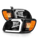 ANZO 00-04 Toyota Tundra (Fits Reg/Acc Cab Only) Crystal Headlights w/Light Bar Black w/Corner Light ANZO Headlights  AXOPROS
