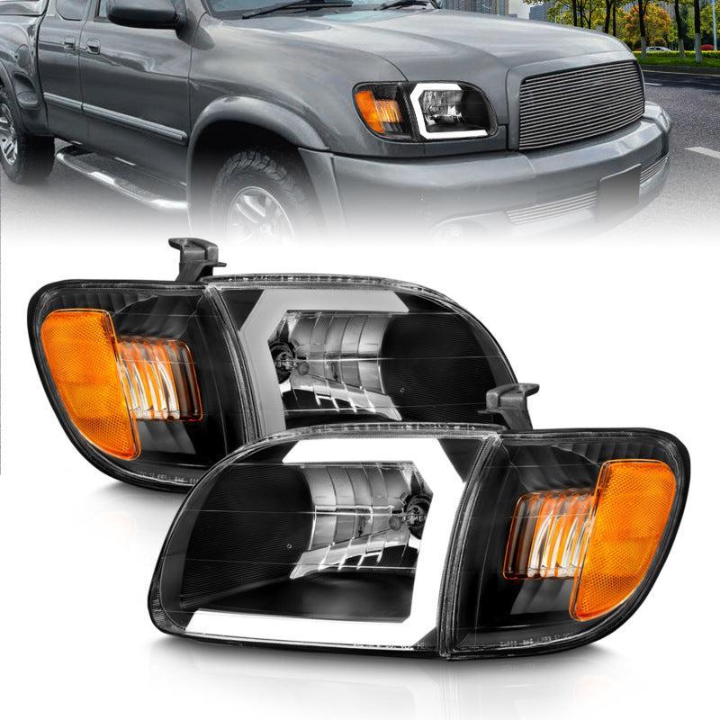 ANZO 00-04 Toyota Tundra (Fits Reg/Acc Cab Only) Crystal Headlights w/Light Bar Black w/Corner Light ANZO Headlights  AXOPROS