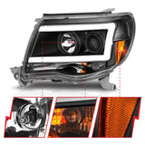 ANZO 05-09 Toyota Tacoma Projector Light Bar Style Headlights w/ C Light Bar ANZO Headlights  AXOPROS