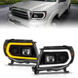 ANZO 05-11 Toyota Tacoma Projector Headlights w/Light Bar Switchback Black Housing ANZO Headlights  AXOPROS